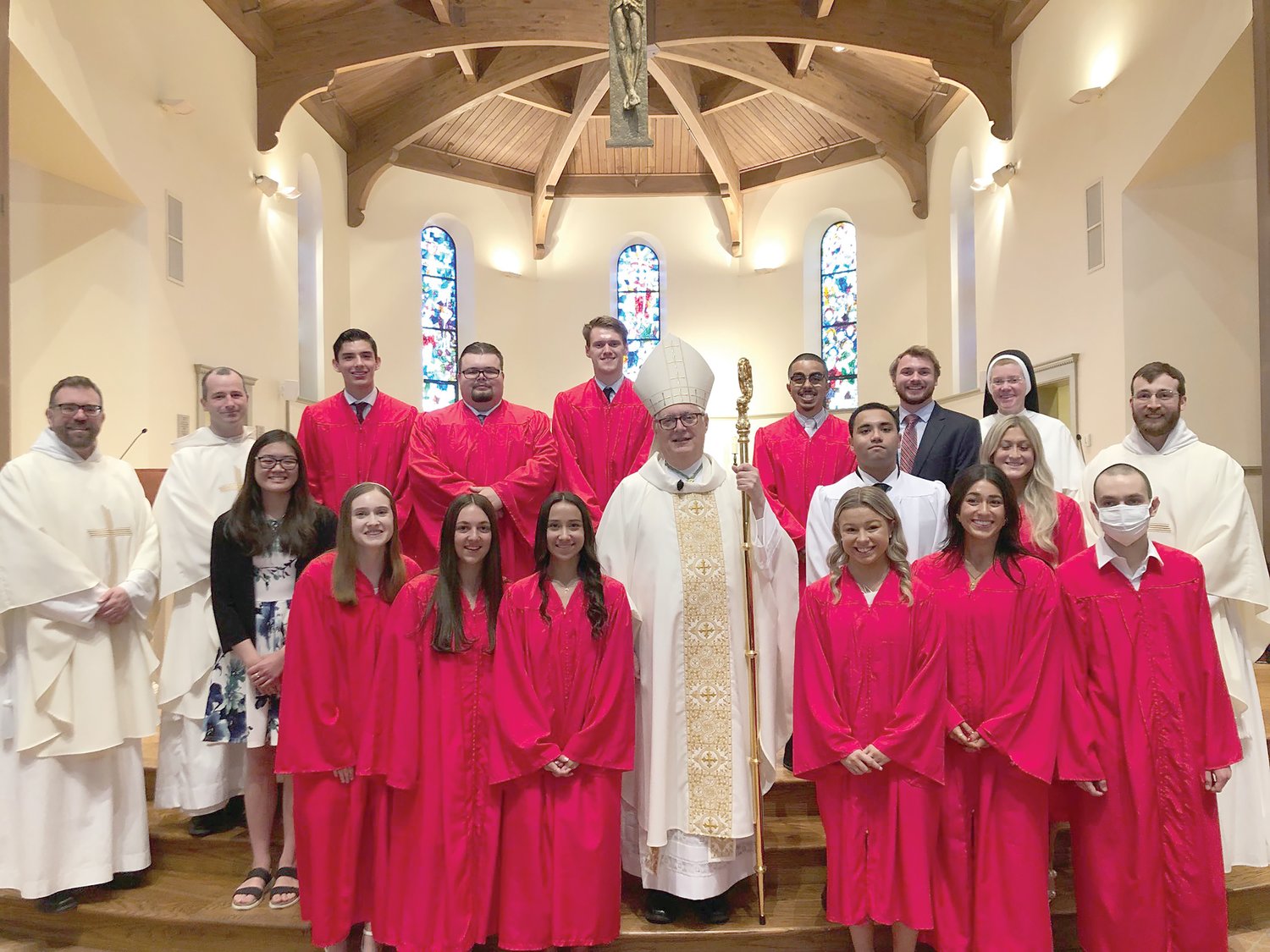 Bishop Thomas J. Tobin gathers with the students on their special day.